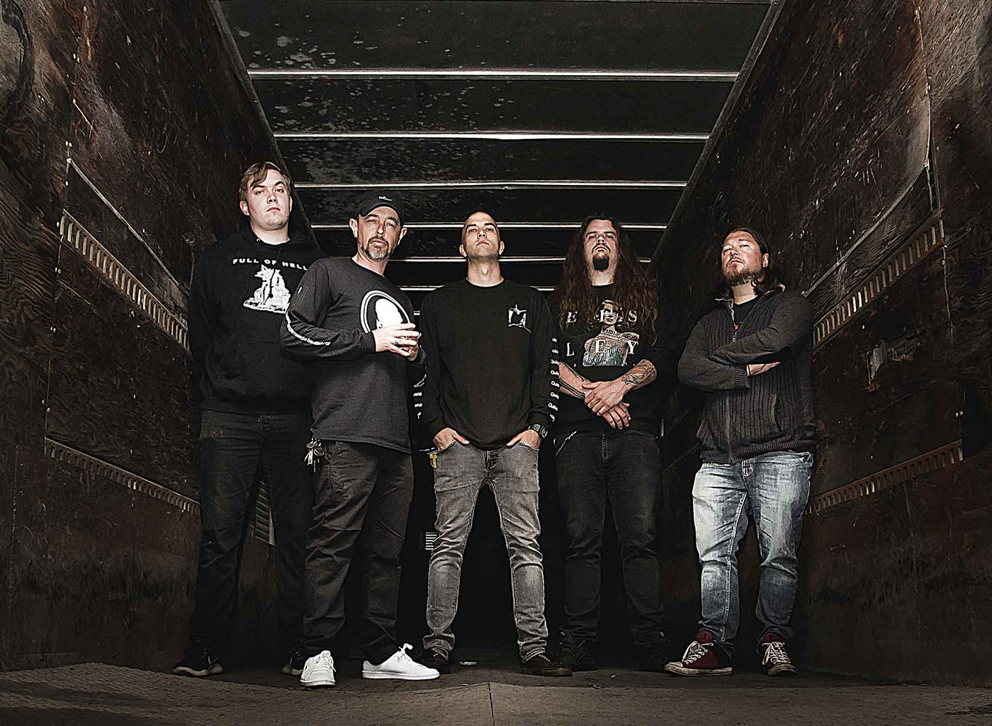 Pyralis Band standing in back of truck
